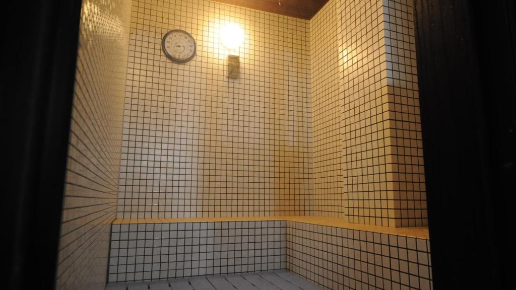 Koupelna v ubytování Onsen Urashima