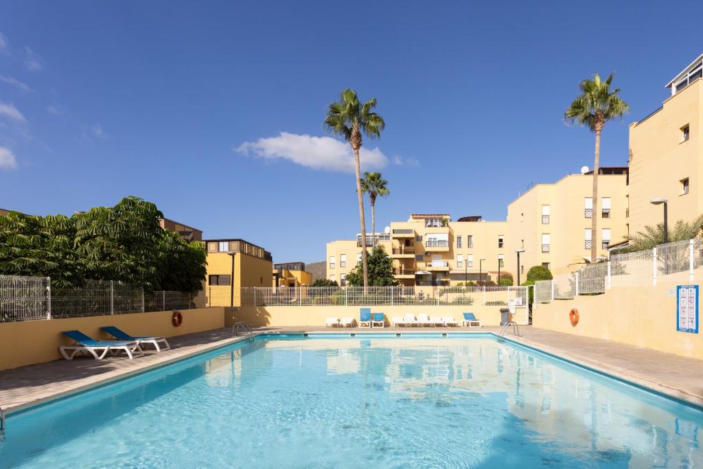 Fotografie z fotogalerie ubytování Home2Book Cozy Apartment Parque La Reina, Pool v destinaci Cho