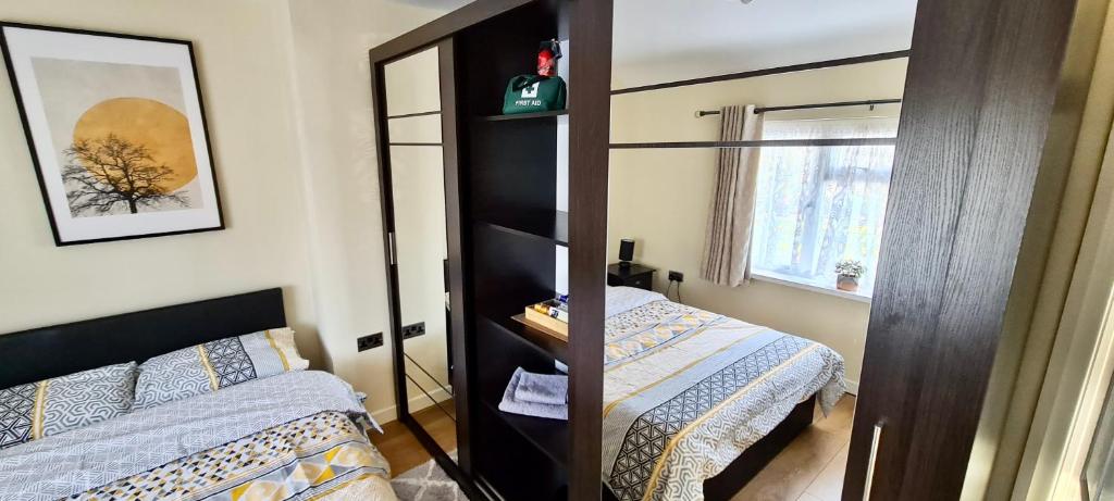 Voodi või voodid majutusasutuse Guest House Rooms Birmingham toas