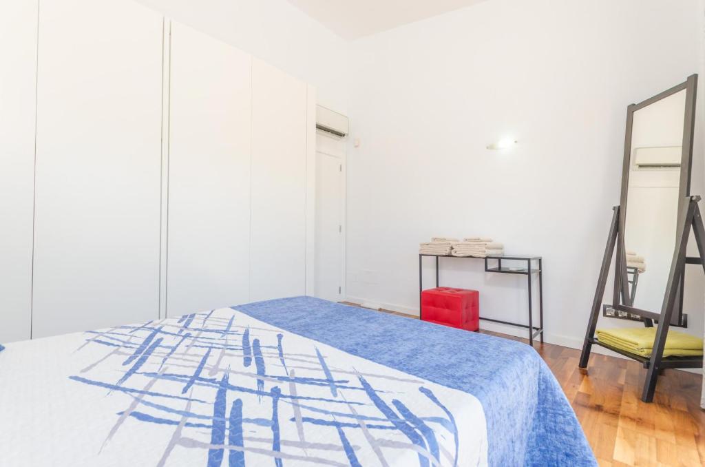 A bed or beds in a room at La Primera