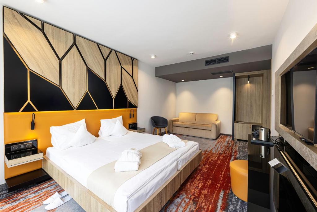 TV a/nebo společenská místnost v ubytování Avar Hotel