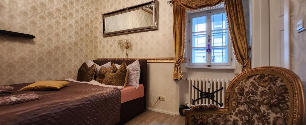 Łóżko lub łóżka w pokoju w obiekcie St. Terezie - Baroque Residence