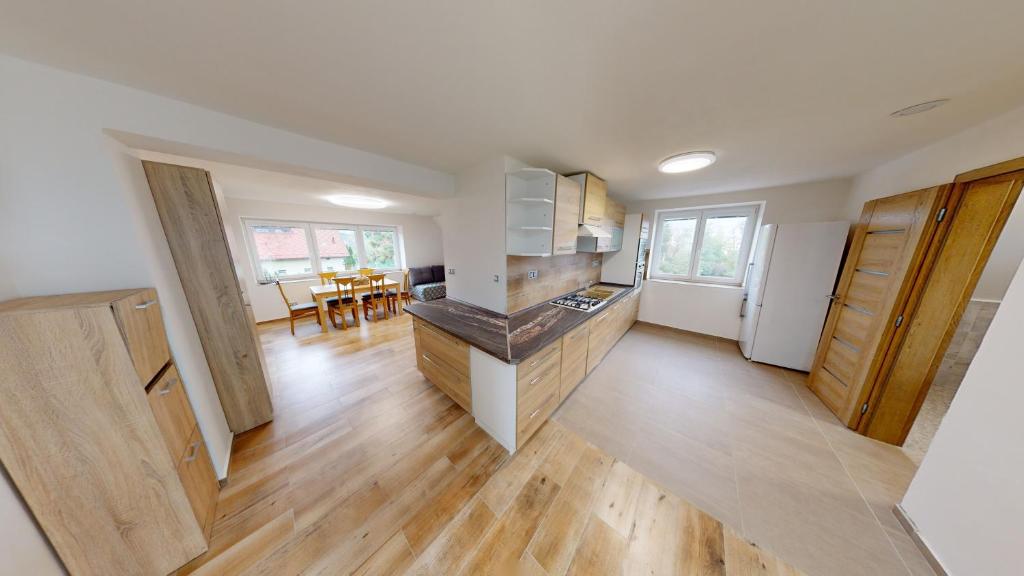 Kuchyň nebo kuchyňský kout v ubytování Apartmány U Mirase