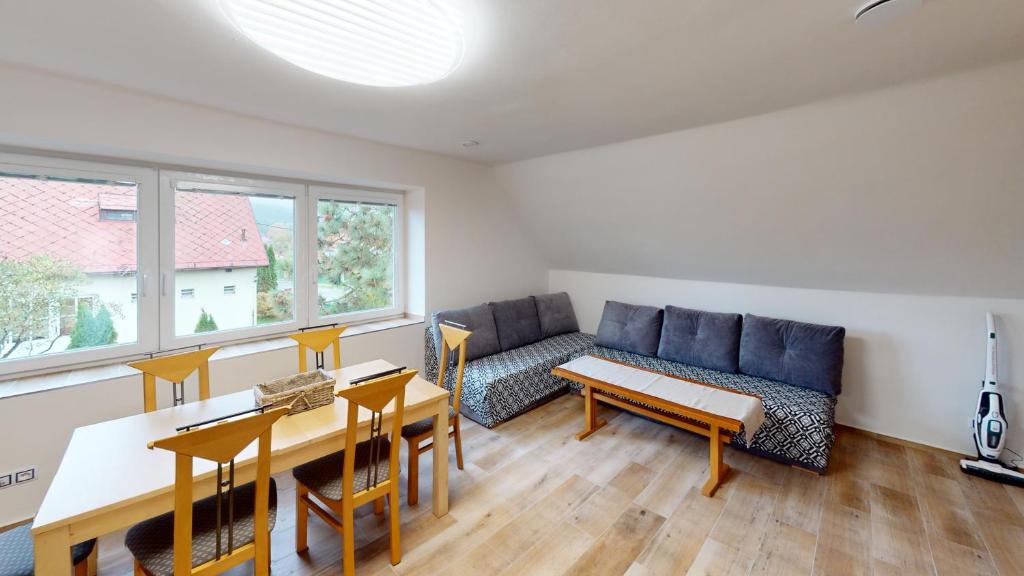 Posezení v ubytování Apartmány U Mirase