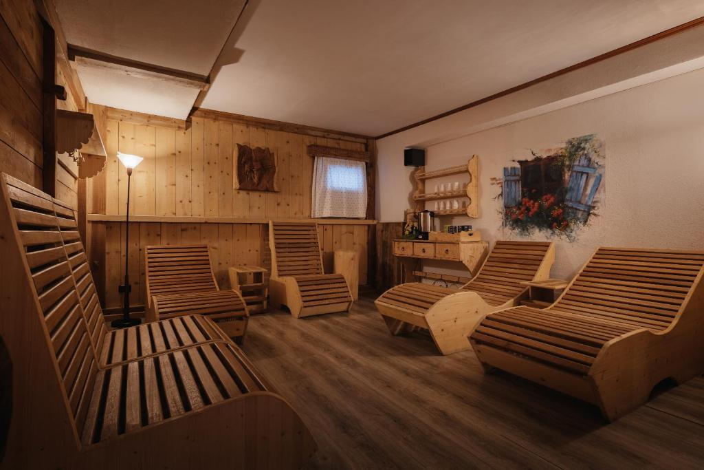 Posezení v ubytování Hotel La Montanara Predazzo
