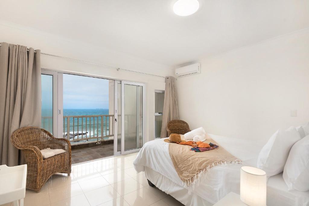Katil atau katil-katil dalam bilik di Escape to a Beach Haven - 505 Sorjente