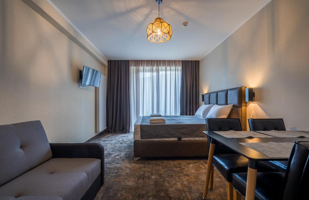 TV a/nebo společenská místnost v ubytování New Gudauri Atrium apartment #233