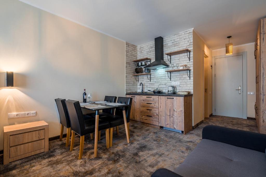 Kuchyň nebo kuchyňský kout v ubytování New Gudauri Atrium apartment #233