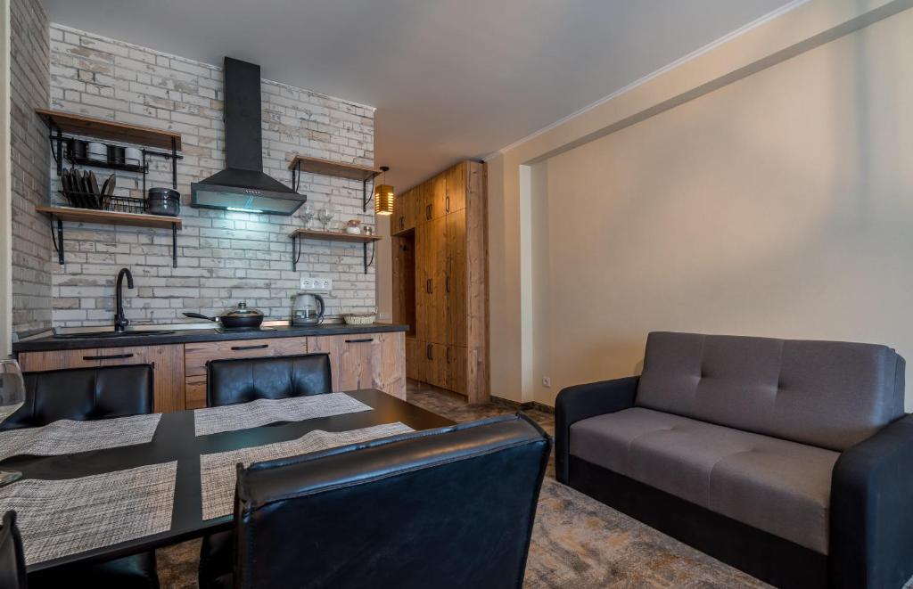 Kuchyň nebo kuchyňský kout v ubytování New Gudauri Atrium apartment #233