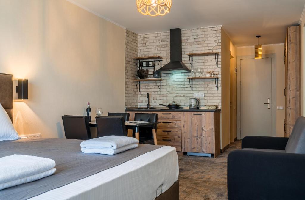 Kuchyň nebo kuchyňský kout v ubytování New Gudauri Atrium apartment #233