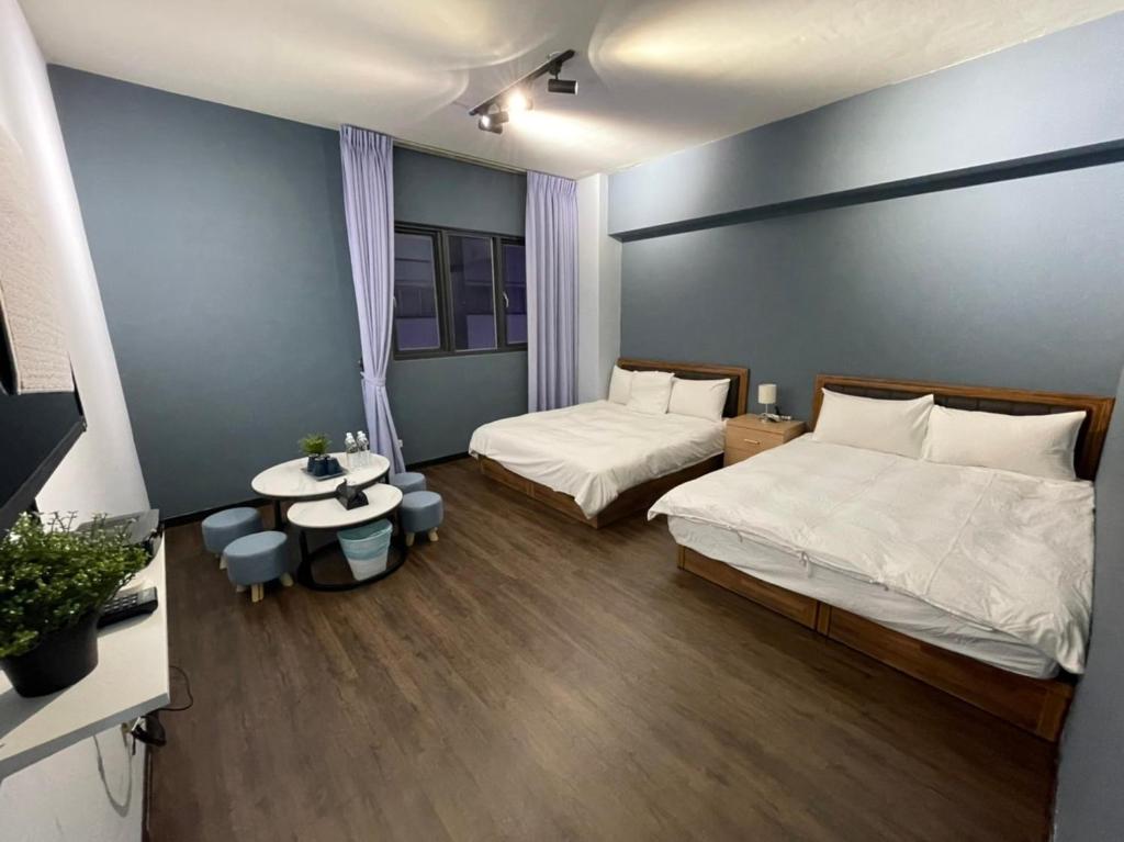 Postel nebo postele na pokoji v ubytování Still Haus 静の宿