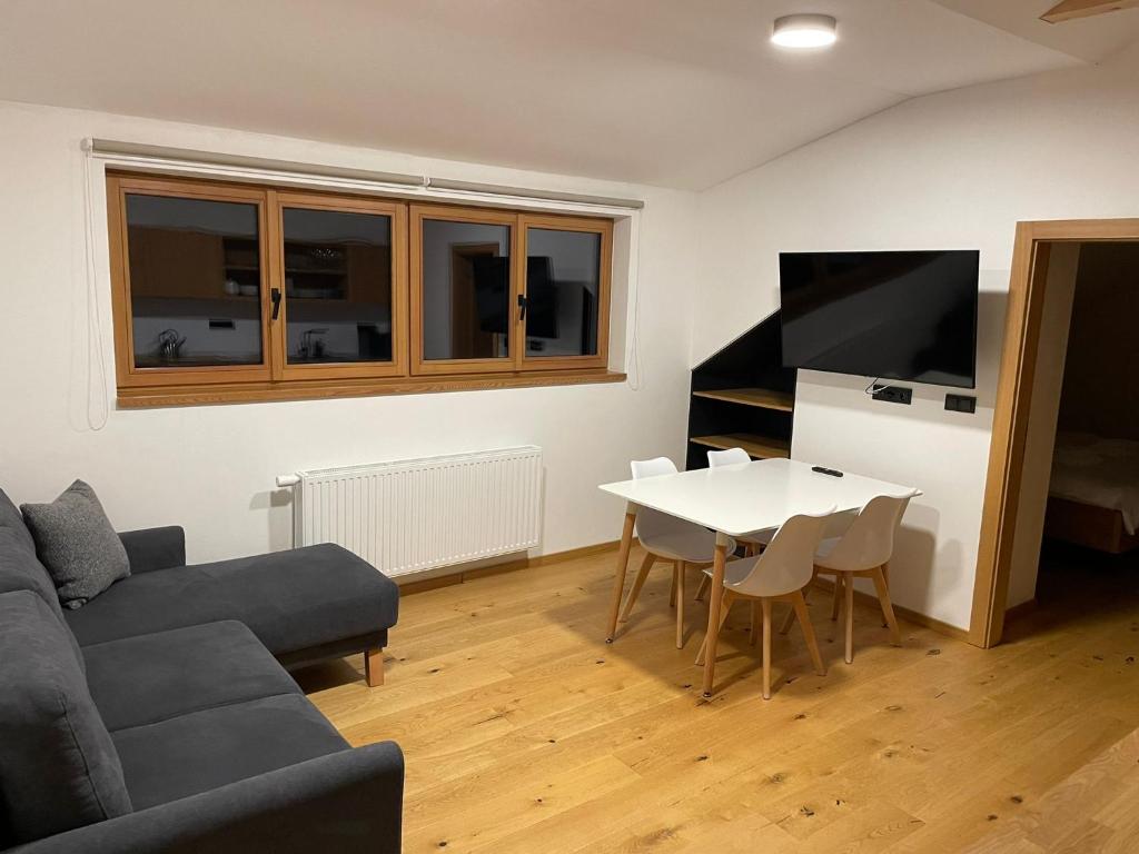TV a/nebo společenská místnost v ubytování Apartmány Hacienda Boží Dar