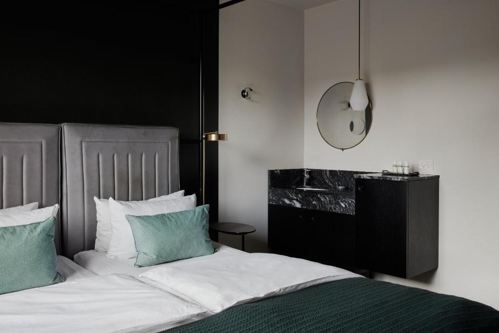 Postel nebo postele na pokoji v ubytování Hotel Danmark