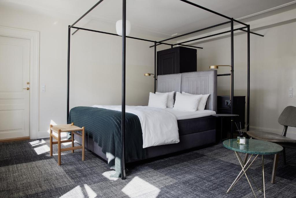 Postel nebo postele na pokoji v ubytování Hotel Danmark