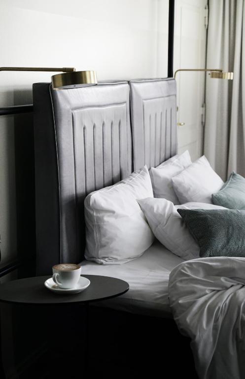 Postel nebo postele na pokoji v ubytování Hotel Danmark