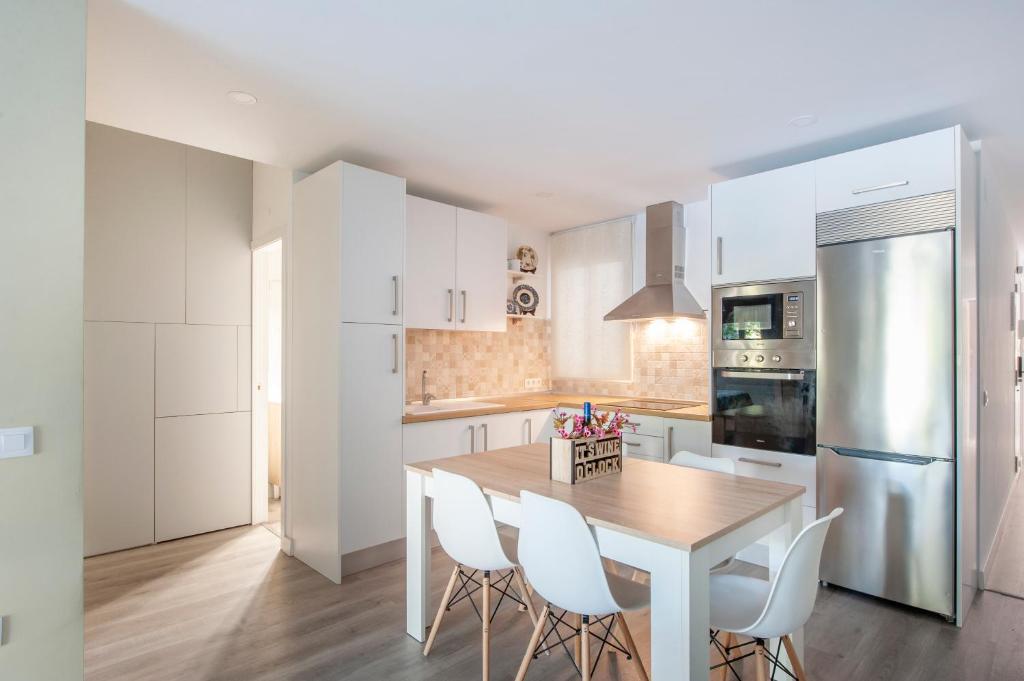 Kuchyň nebo kuchyňský kout v ubytování Casa Valentina: Confort y Luz en Sevilla Centro