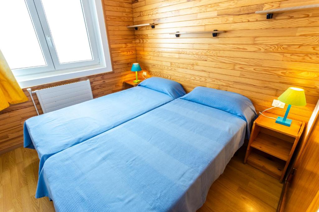 Postel nebo postele na pokoji v ubytování Meritxell Pedrous
