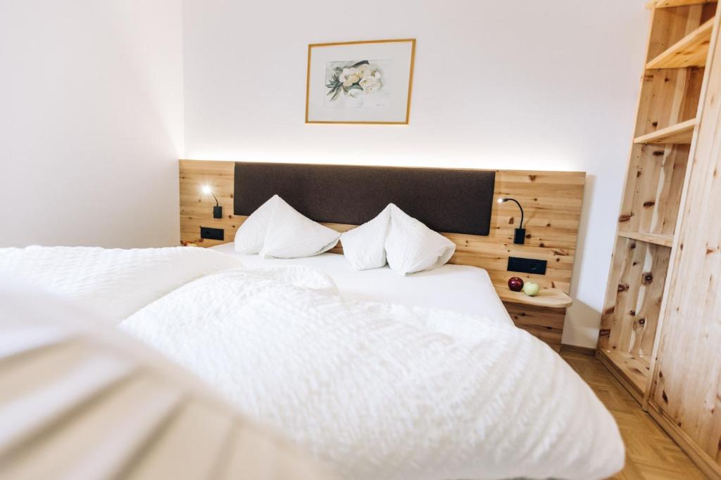 Postel nebo postele na pokoji v ubytování Amplatz 1523 - B&B and Suites