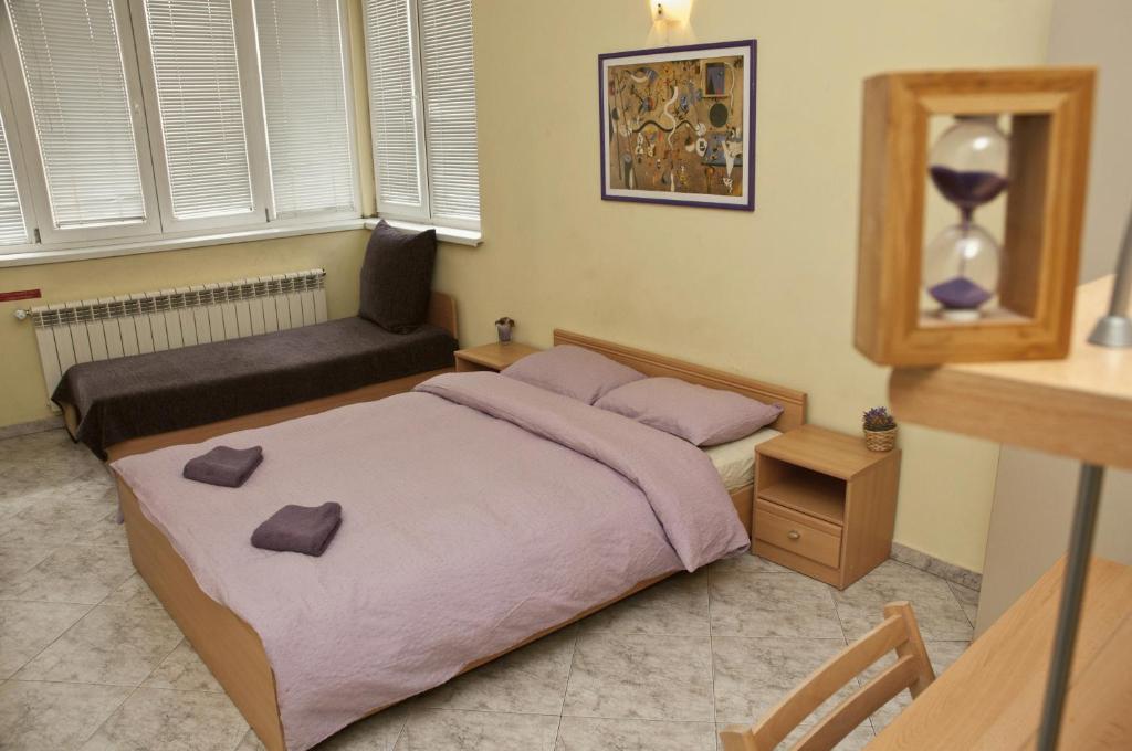 Postel nebo postele na pokoji v ubytování Hostel Mostel Sofia