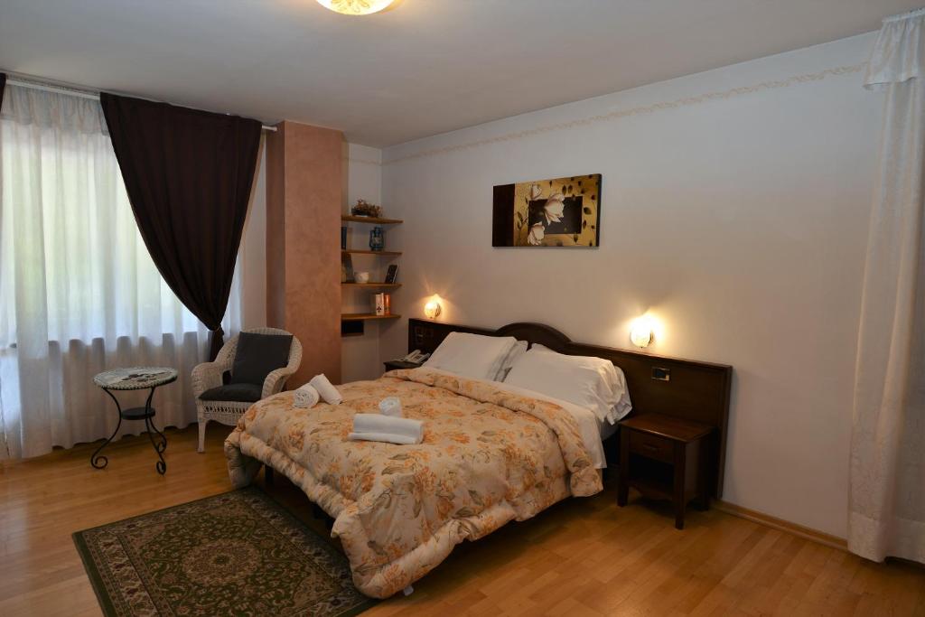 Postel nebo postele na pokoji v ubytování Hotel Marianna