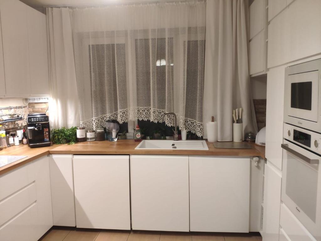 Kuchyň nebo kuchyňský kout v ubytování Pod Skrzydłami Podlasia