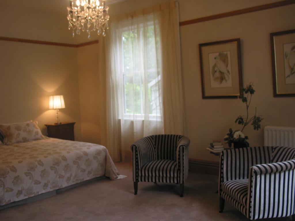 Postel nebo postele na pokoji v ubytování The Peppertree Luxury Accommodation