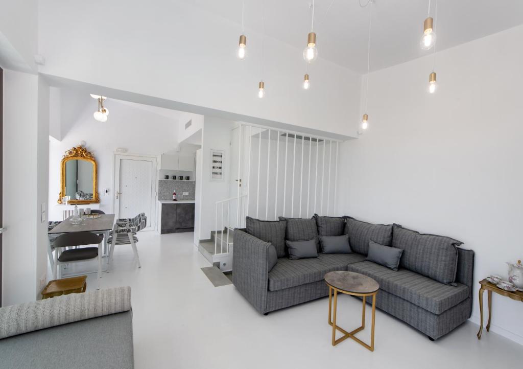 Posezení v ubytování Villa Anthos - Fresh modern villa, pool, close to the beach