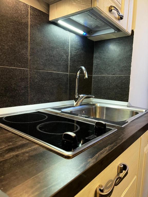 Kuchyň nebo kuchyňský kout v ubytování B&B Room Code 1