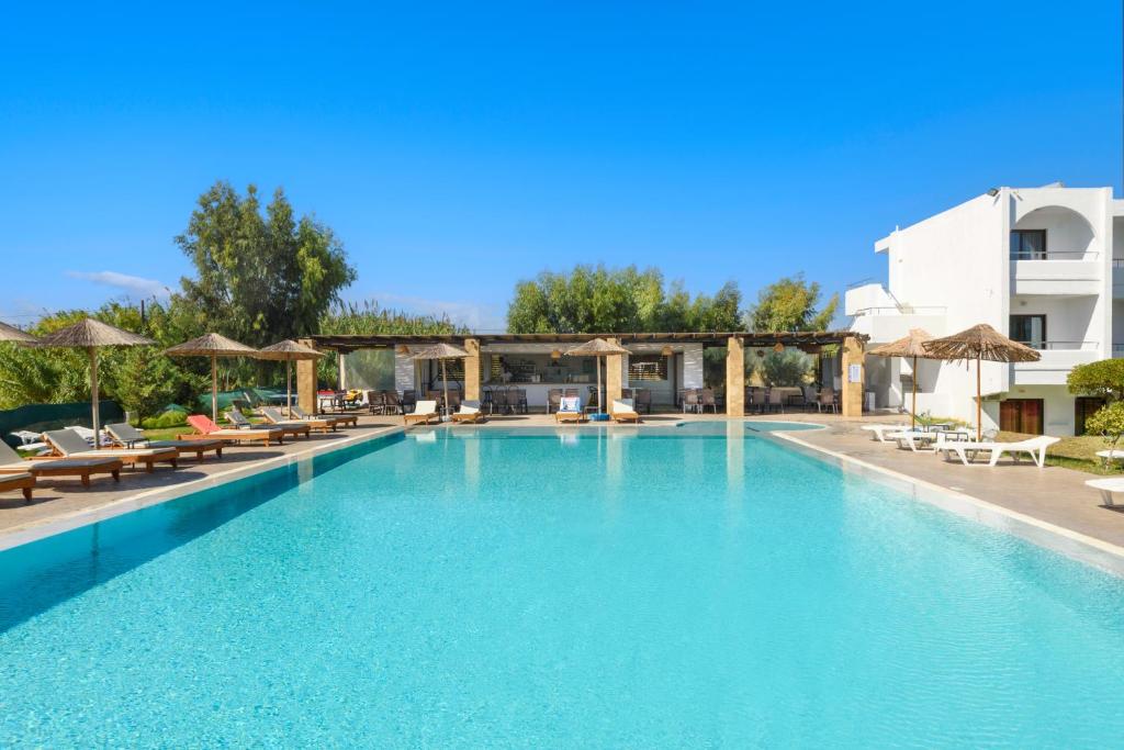 The swimming pool at or close to Afandou Blu