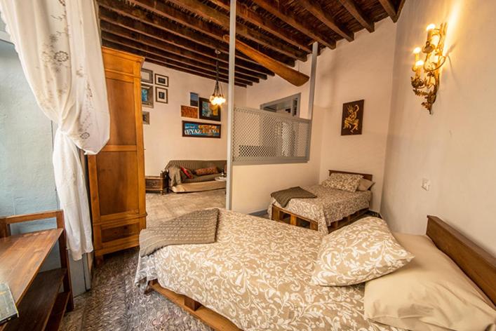 Posteľ alebo postele v izbe v ubytovaní Mi casa es tu casa
