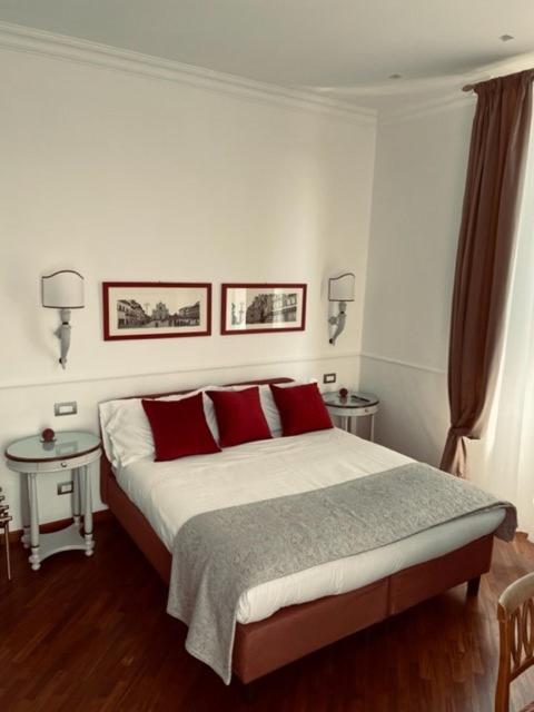 A bed or beds in a room at Suite Aria d'Arte 1