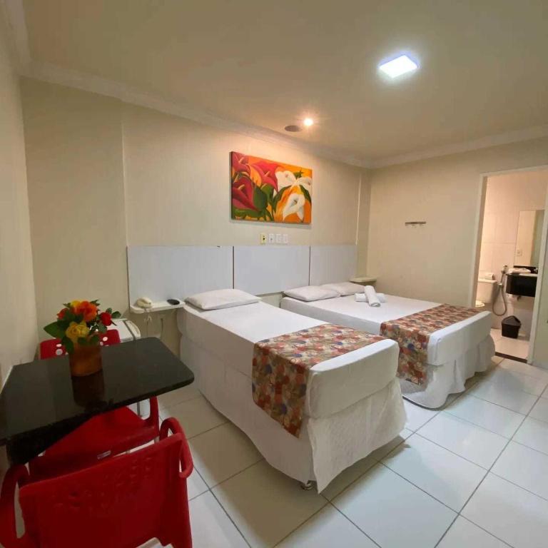 Postel nebo postele na pokoji v ubytování Hotel Monte Rei