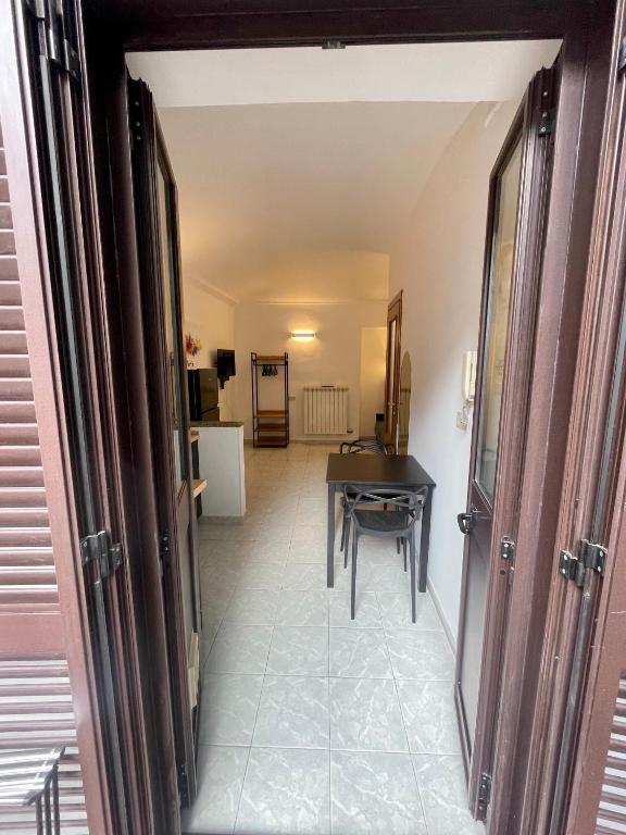 A kitchen or kitchenette at Casa Belfiore - vicino Porta Nuova F.S.