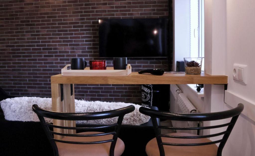 TV a/nebo společenská místnost v ubytování Narva City