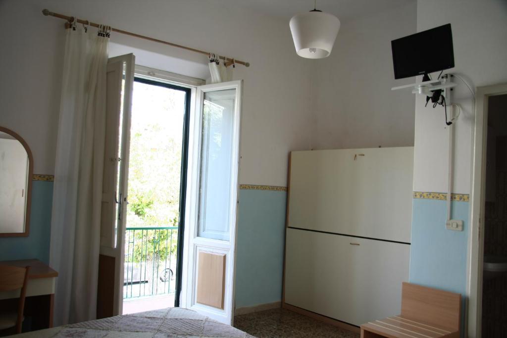 Kuchyň nebo kuchyňský kout v ubytování Hotel Ornella