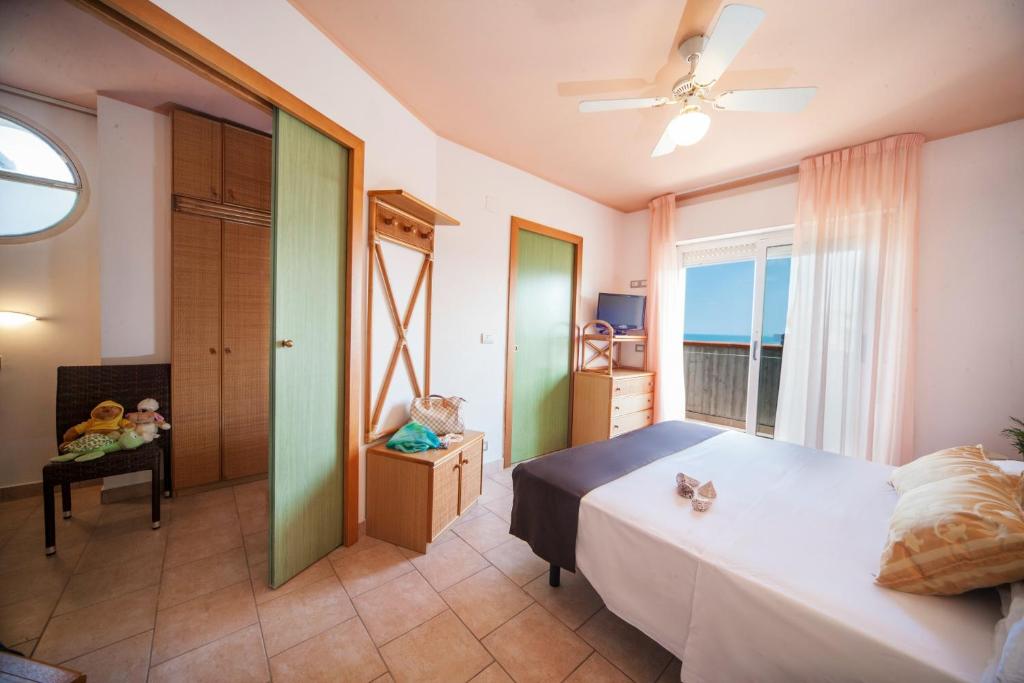 Posteľ alebo postele v izbe v ubytovaní Hotel Doge