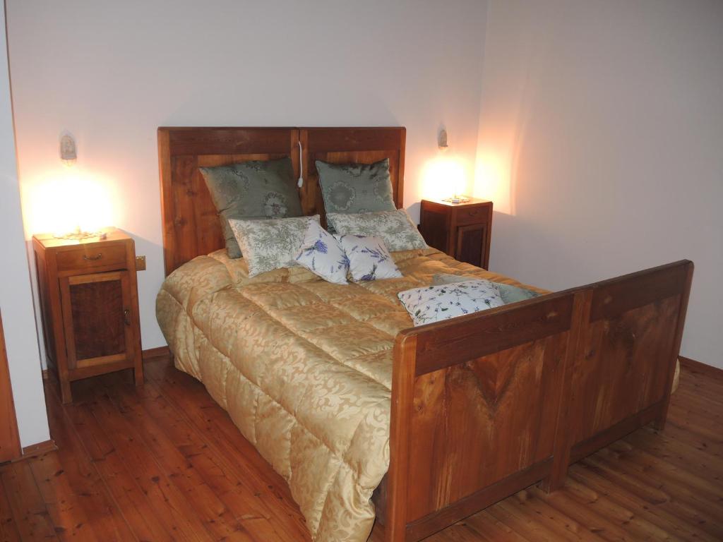 Postel nebo postele na pokoji v ubytování Agriturismo Crodi