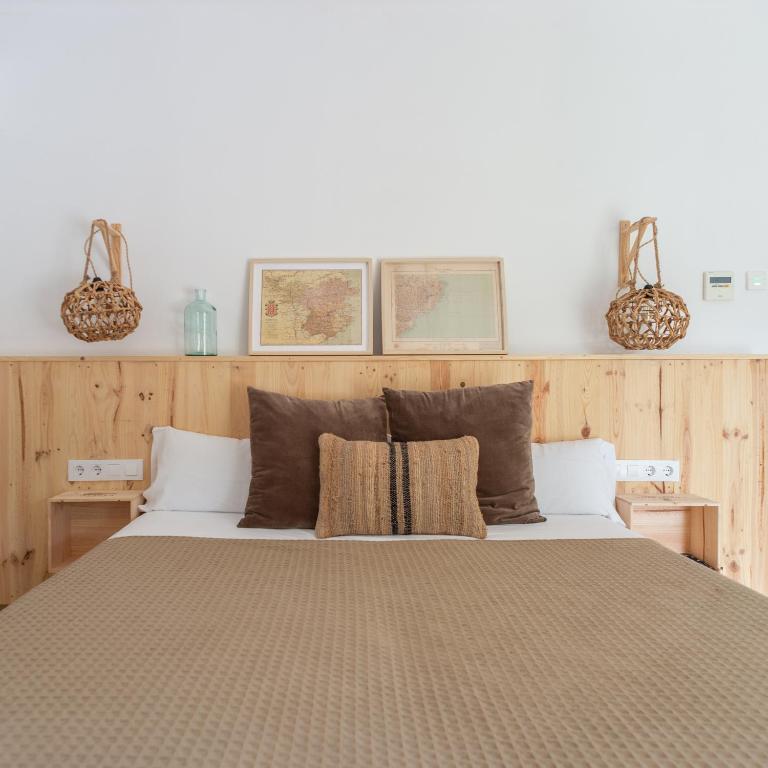 Postel nebo postele na pokoji v ubytování Hostal Sa Teula