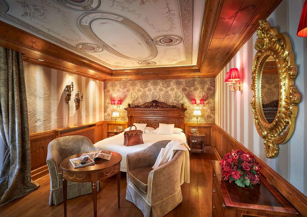 Postel nebo postele na pokoji v ubytování Hotel Miramonti