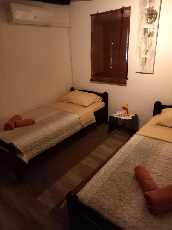 Posteľ alebo postele v izbe v ubytovaní Old town Apartment