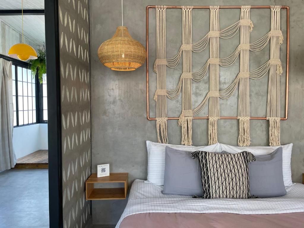Postel nebo postele na pokoji v ubytování La Botanica Hotel