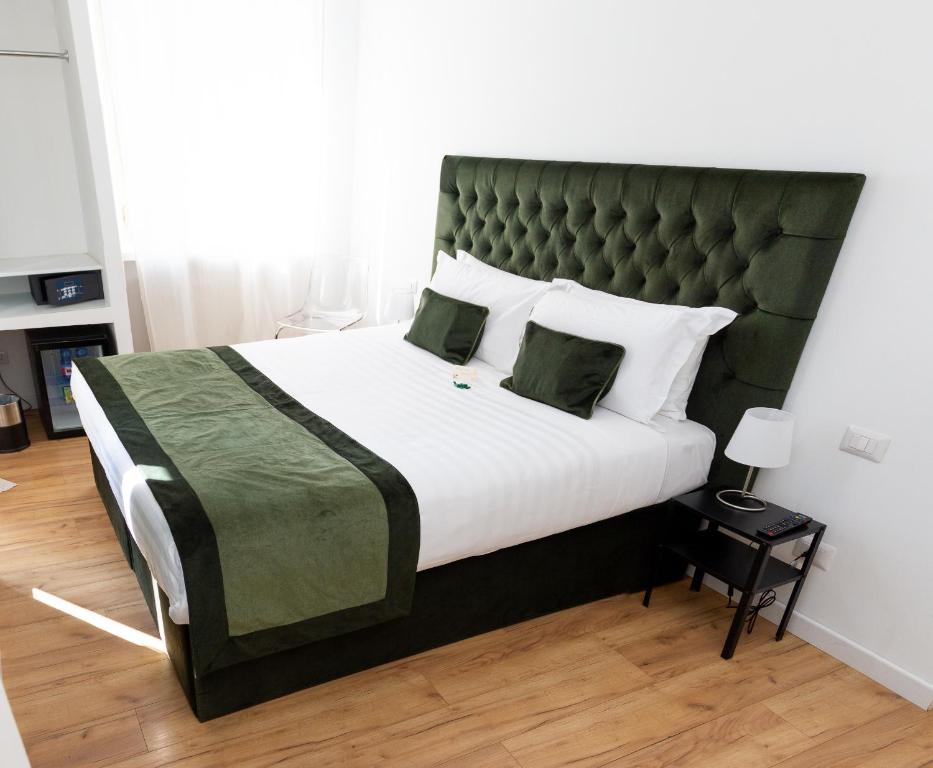 A bed or beds in a room at Home at Rome St. Peter Guest House