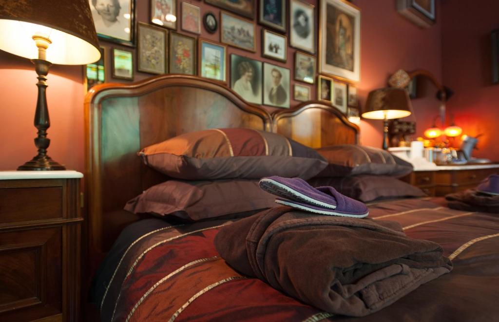 Postel nebo postele na pokoji v ubytování B&B De Lachende Engel