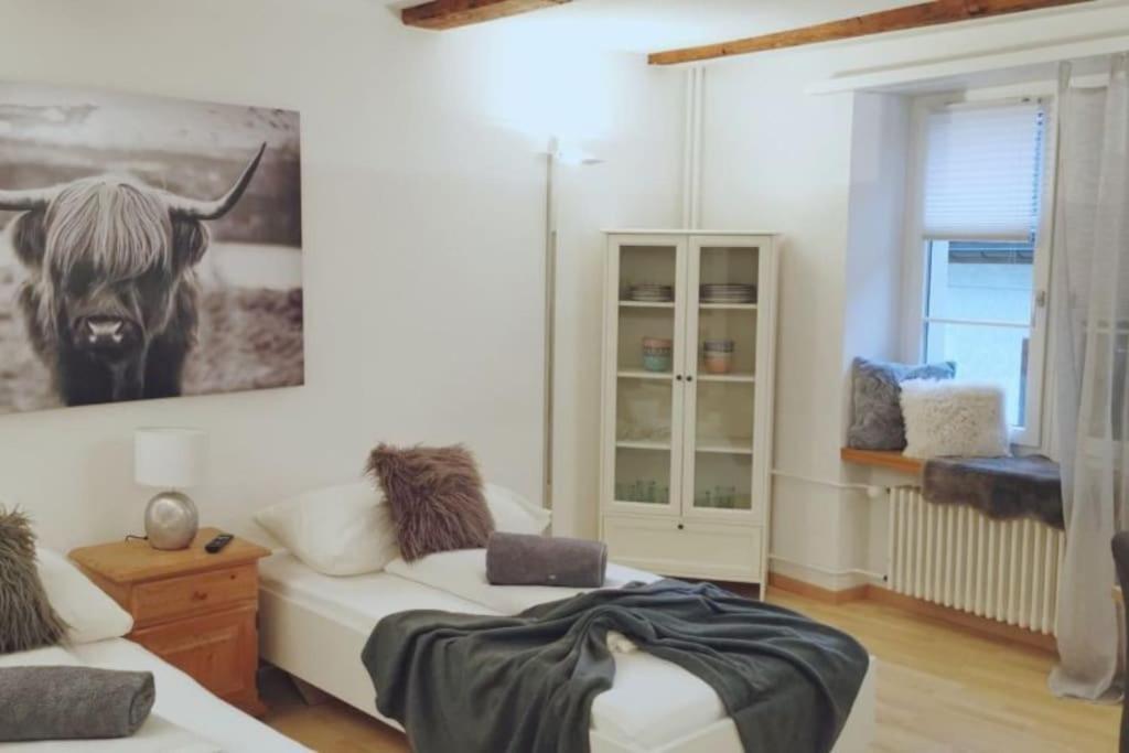 Postel nebo postele na pokoji v ubytování La Suite