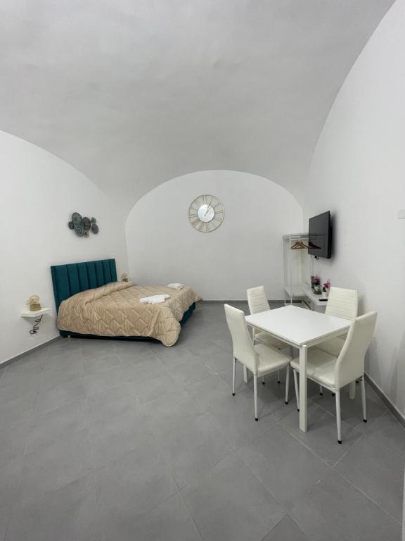 Postel nebo postele na pokoji v ubytování B&B suite anfiteatro Pozzuoli