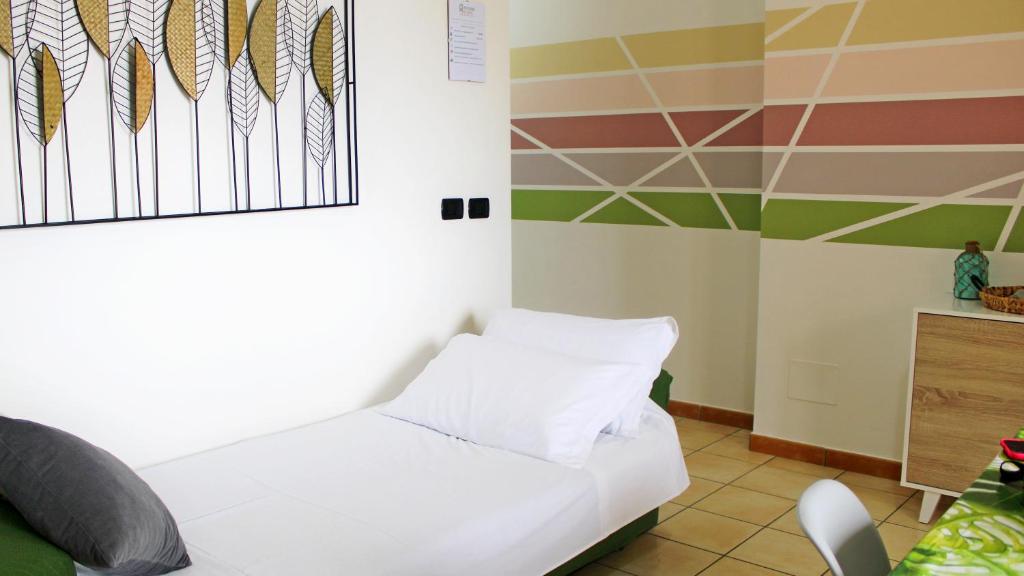 Posteľ alebo postele v izbe v ubytovaní Capo d'Orlando Apartments - Cipria