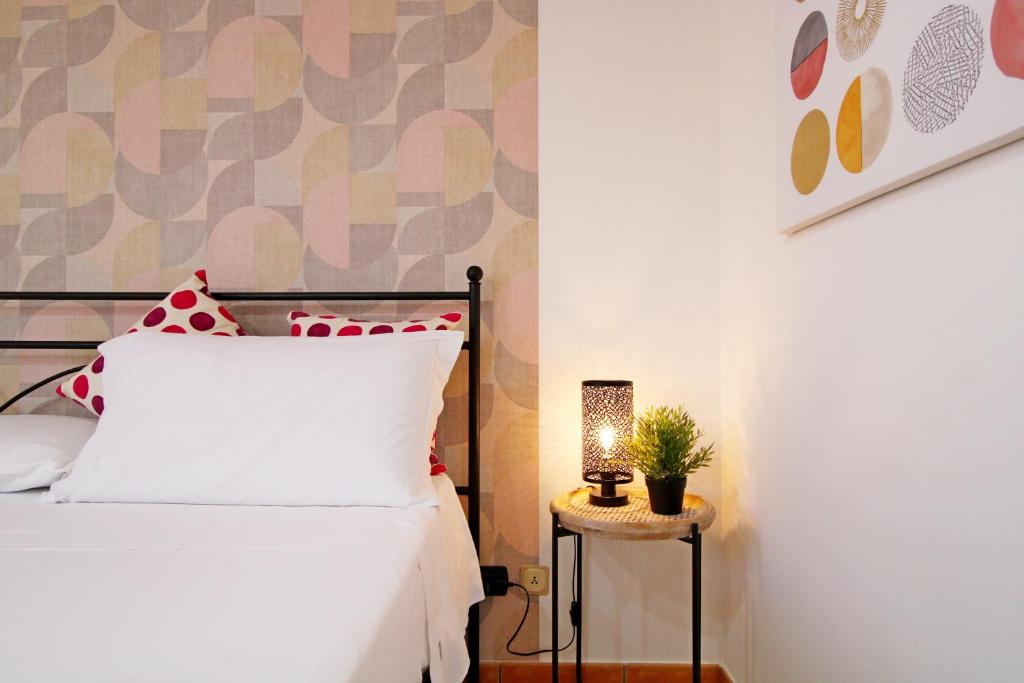 Posteľ alebo postele v izbe v ubytovaní Capo d'Orlando Apartments - Cipria