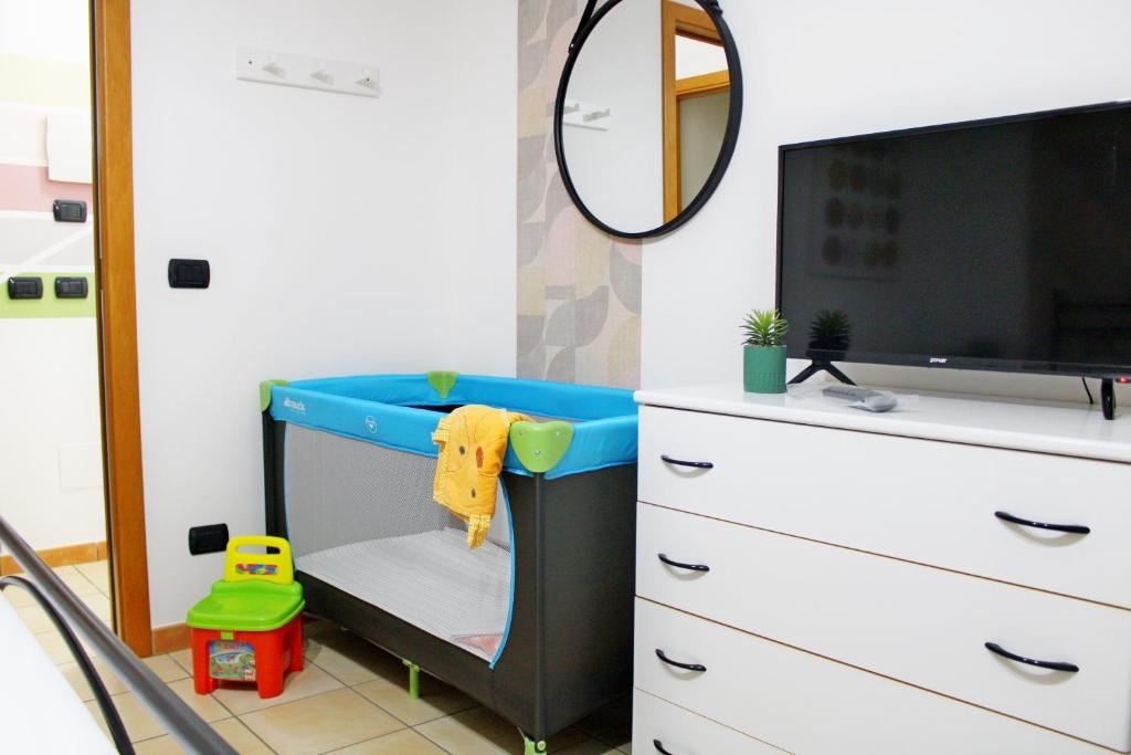Televízia a/alebo spoločenská miestnosť v ubytovaní Capo d'Orlando Apartments - Cipria