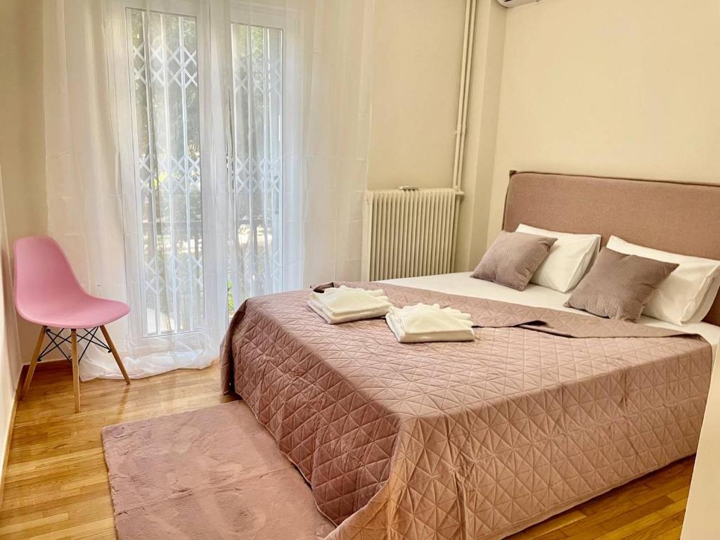 Posteľ alebo postele v izbe v ubytovaní Cute Nikis Apartment VIPGreece