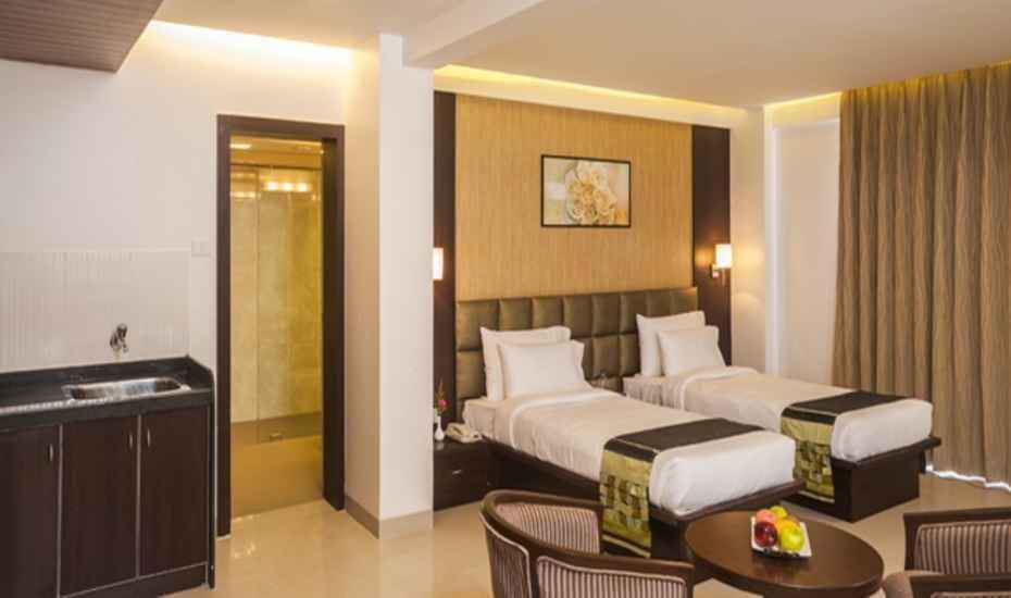 Postel nebo postele na pokoji v ubytování Hotel DORTN Hinjawadi Phase 1